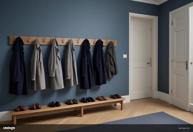 A hallway coat rack with every hook full of coats and shoes lined up beneath it.