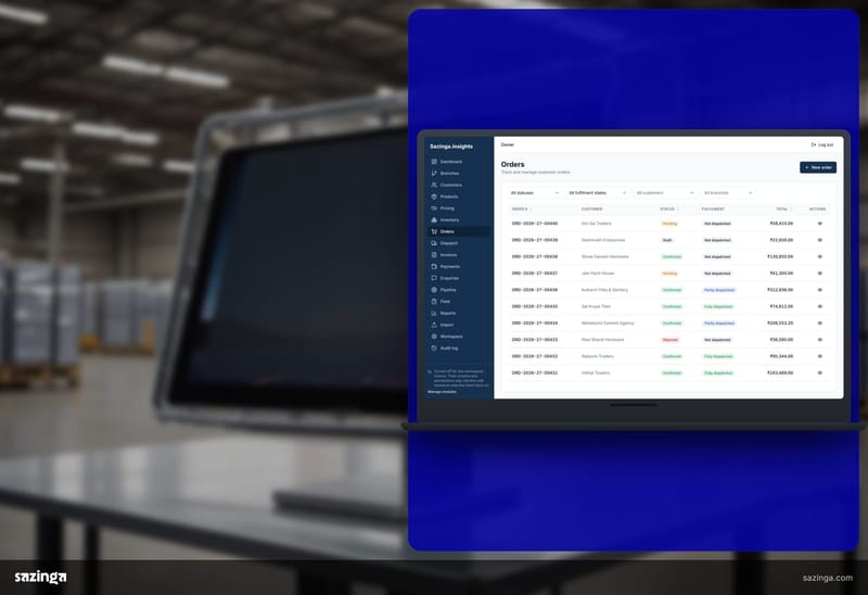 A monitor on a desk in a warehouse showing the orders list in the Sazinga Field portal, where promotion dates have to match the business clock.