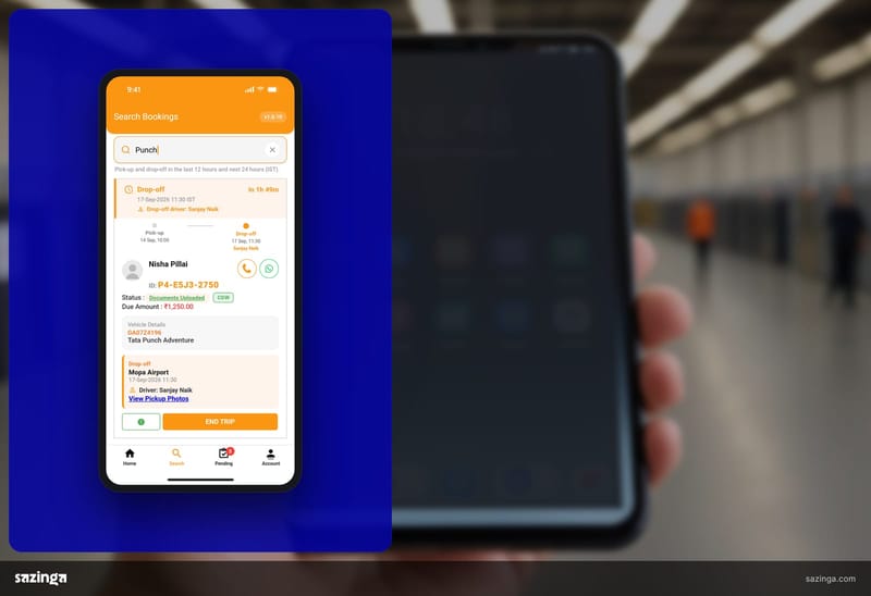 A driver in a depot checking a booking card in Sazinga Rentals on a phone.