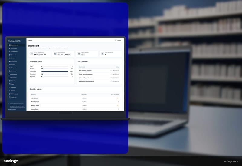 A laptop on a distributor counter in front of shelves showing the dashboard of the Sazinga Field portal.