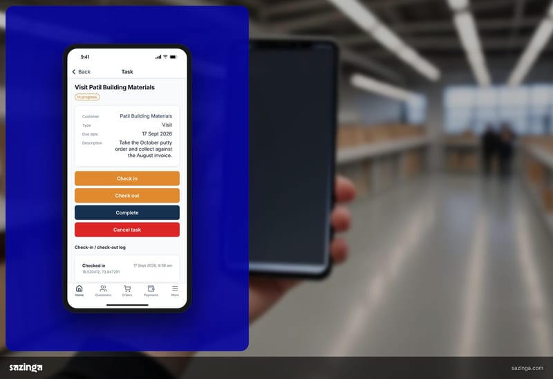 A rep holding a phone in a warehouse using the visit check-in screen in Sazinga Field, the kind of moment where signal can drop.