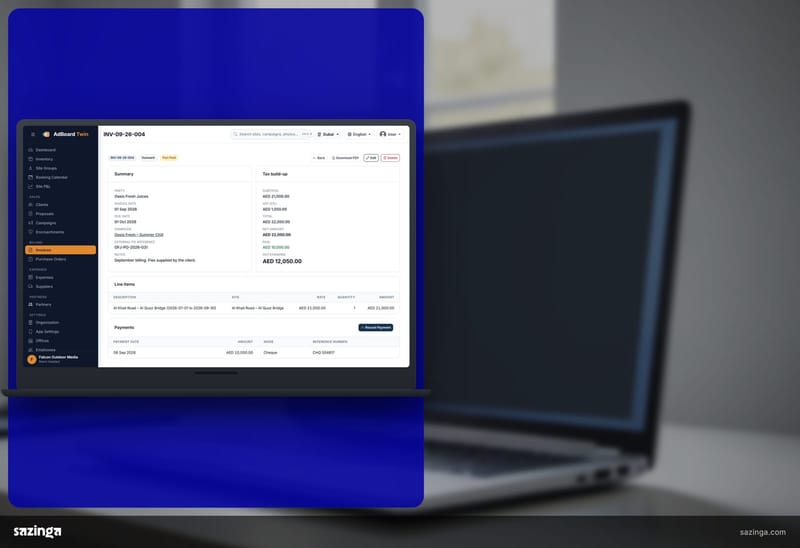 An accounts officer at a desk entering an invoice in Sazinga AdBoard on a laptop in a bright office.