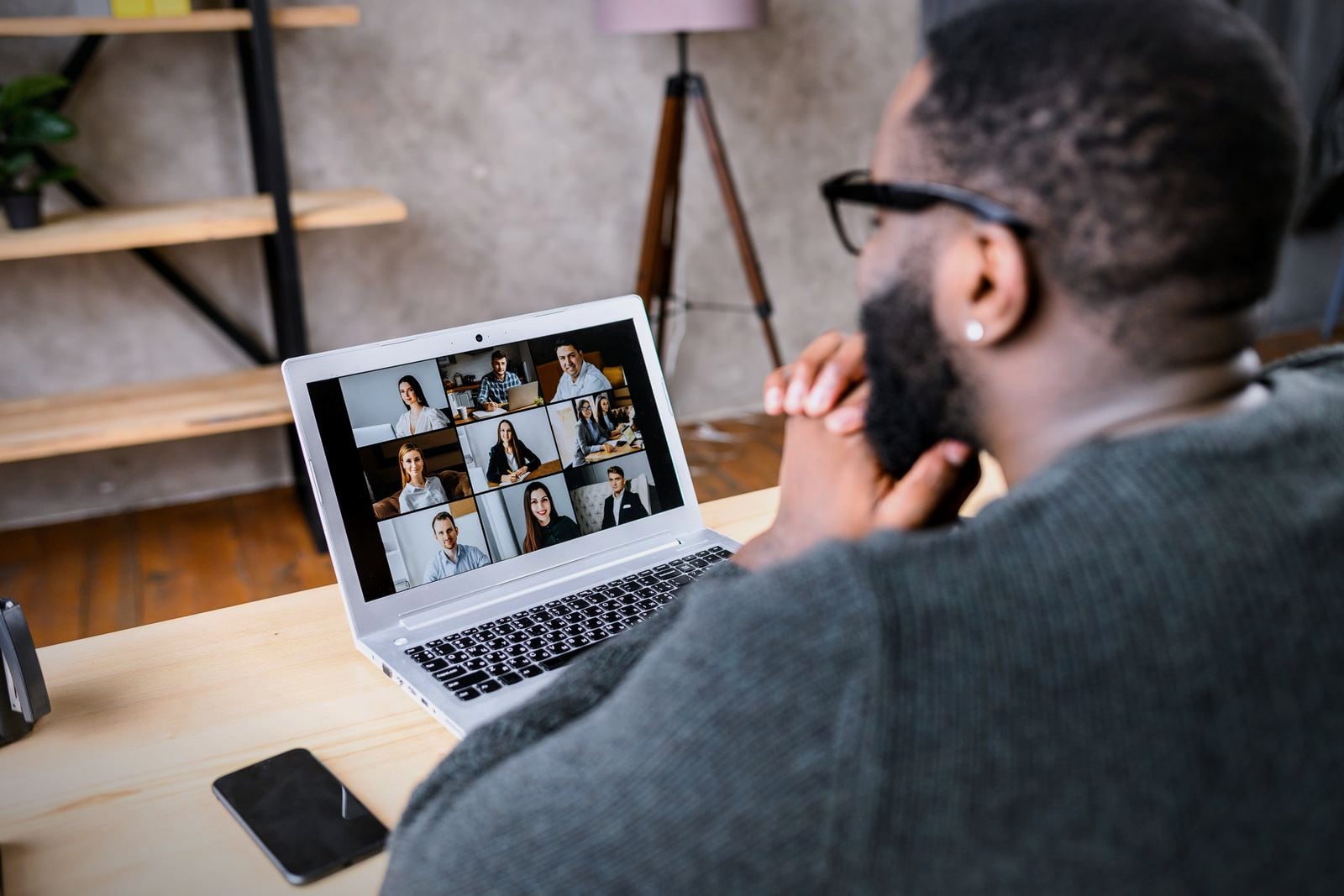 A product owner on a video call with a remote engineering team